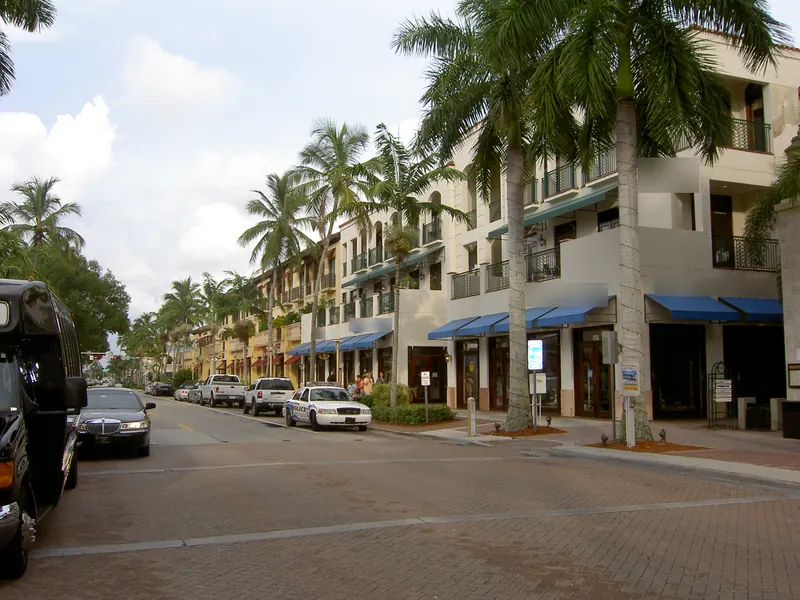 Shops and palms along Fifth Avenue South in downtown Naples, Florida